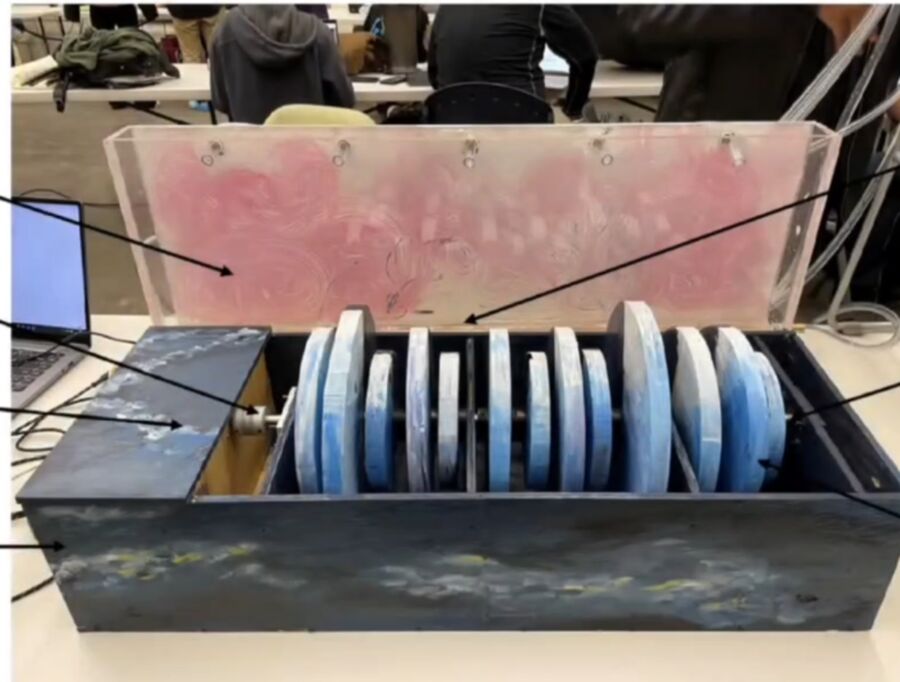 Kinetic art installation with blue wooden plates
